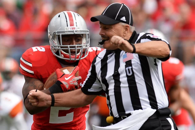 ohio state umpire block feat Ohio State running back plows the umpire